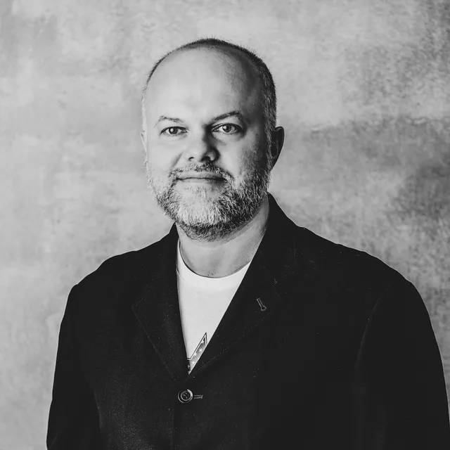 Tomasz Joniak, black-and-white portrait