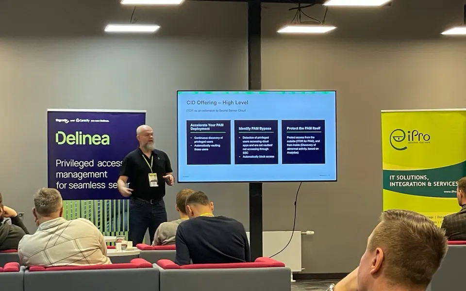 Tomasz Joniak presenting Delinea privileged access management at the iPro event in Riga